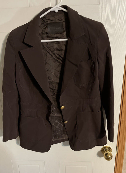 Bally women's black blazer with notched lapels and button closure hanging on a white hanger