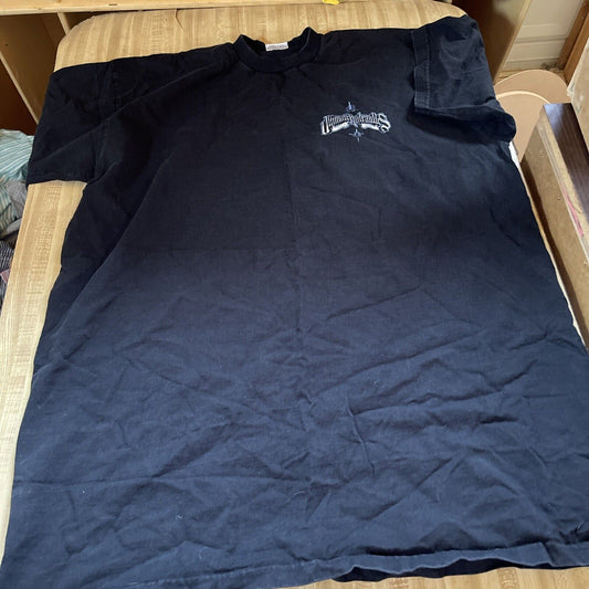 Black big and tall workwear t-shirt with small logo on chest laid flat on bed