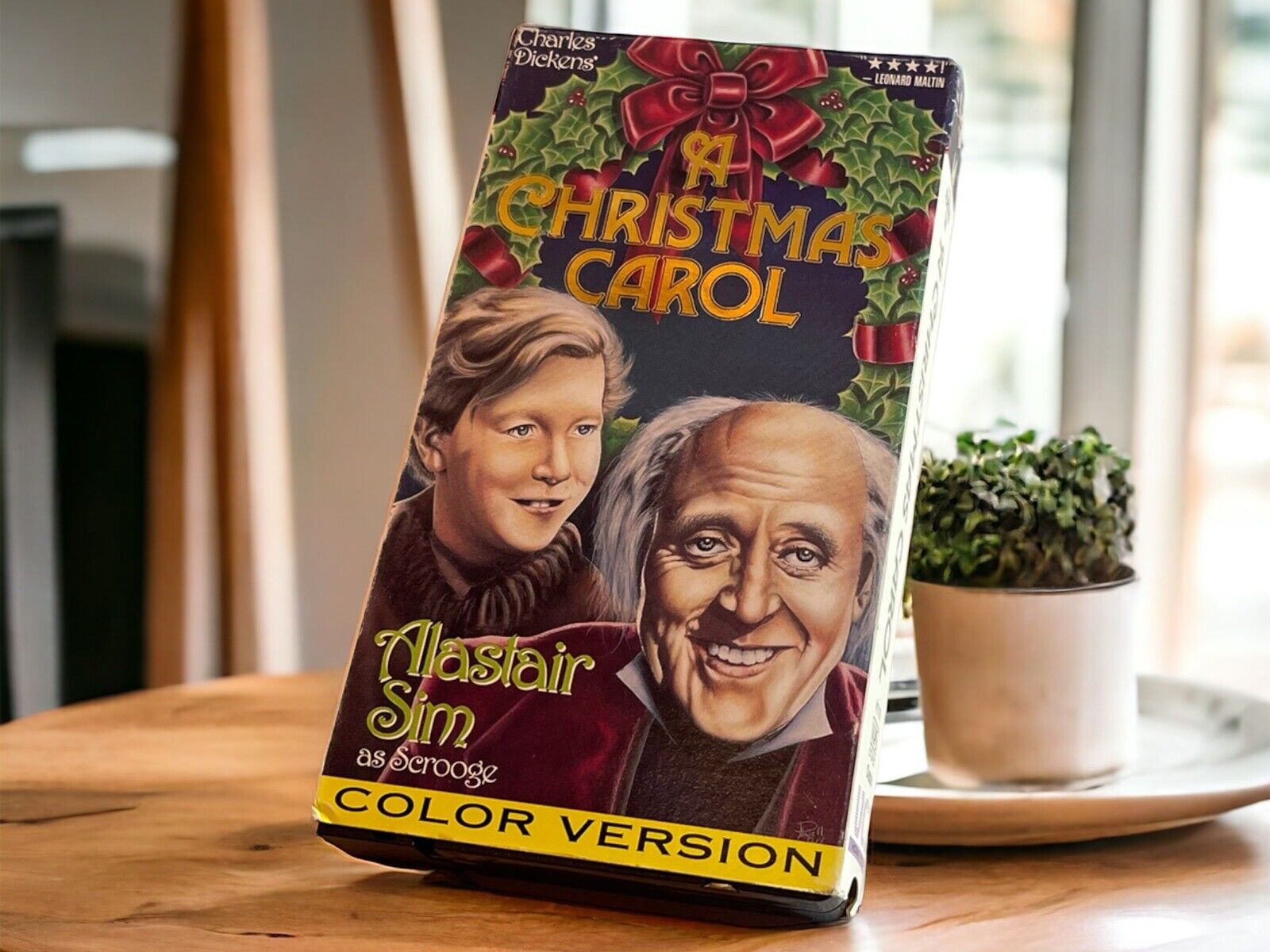 Colorized vintage Christmas film A Christmas Carol VHS tape featuring Alastair Sim as Scrooge