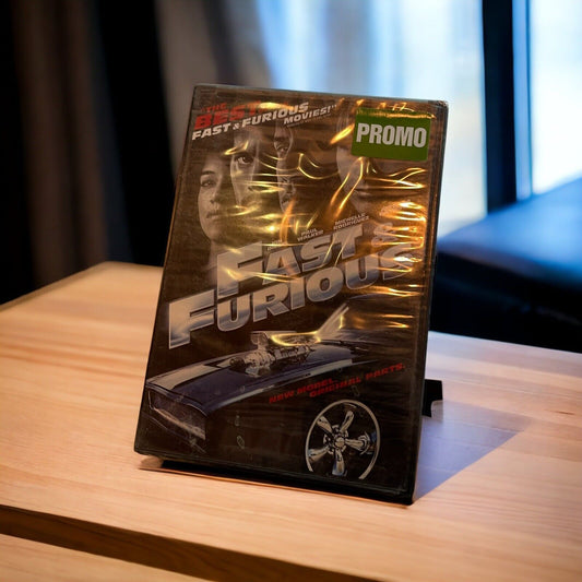 Collectible Fast and Furious movie DVD with iconic car and promotional sticker on wooden table
