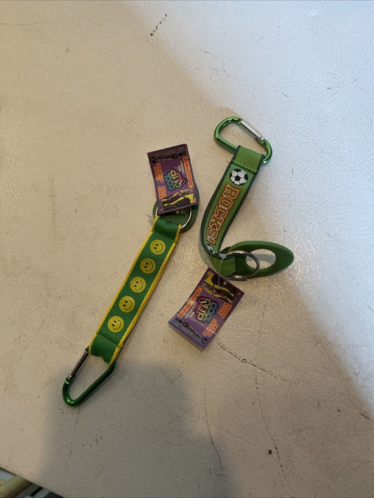 Green cool clip lanyard for sports with smiley face and hockey designs attached to carabiner clips