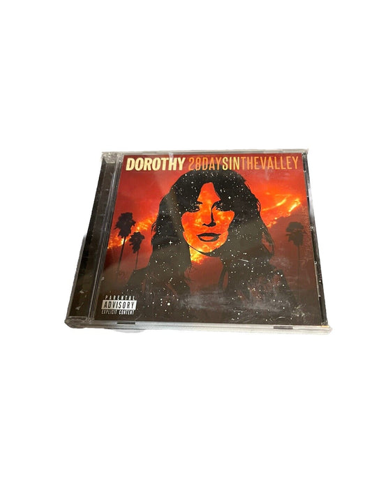 Dorothy 28 Days in the Valley CD with cover art featuring a woman's face and sunset background