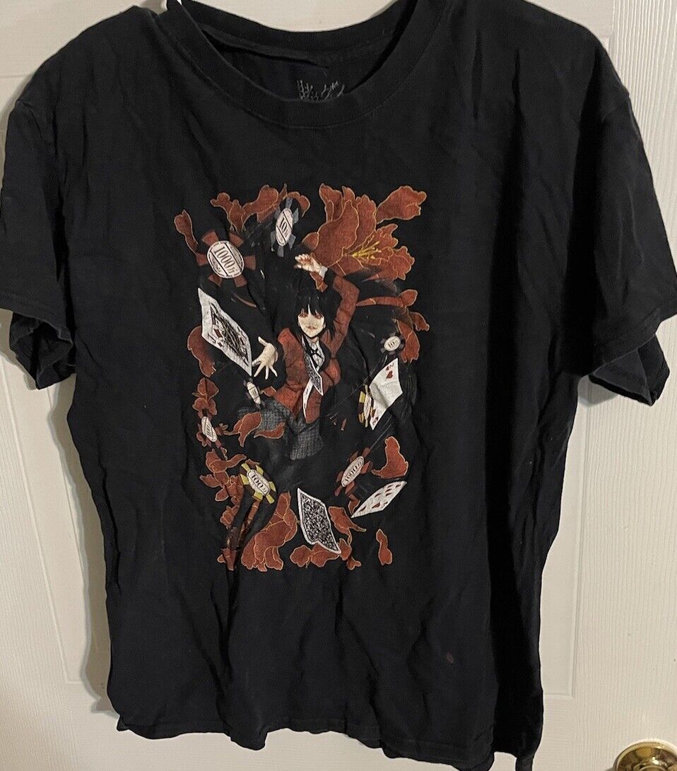 Black large anime t shirt featuring a detailed character design with playing cards and autumn leaves