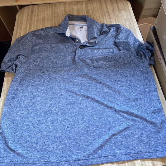 Men's 3XLT golf polo in heather blue with short sleeves and buttoned collar laid flat on wooden surface