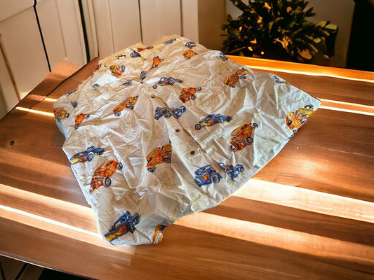 Men's 4XL Hawaiian shirt with vintage car print laid on wooden table