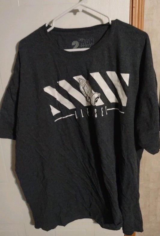 Mens black casual t shirt 3XL with white graphic design hanging on white hanger
