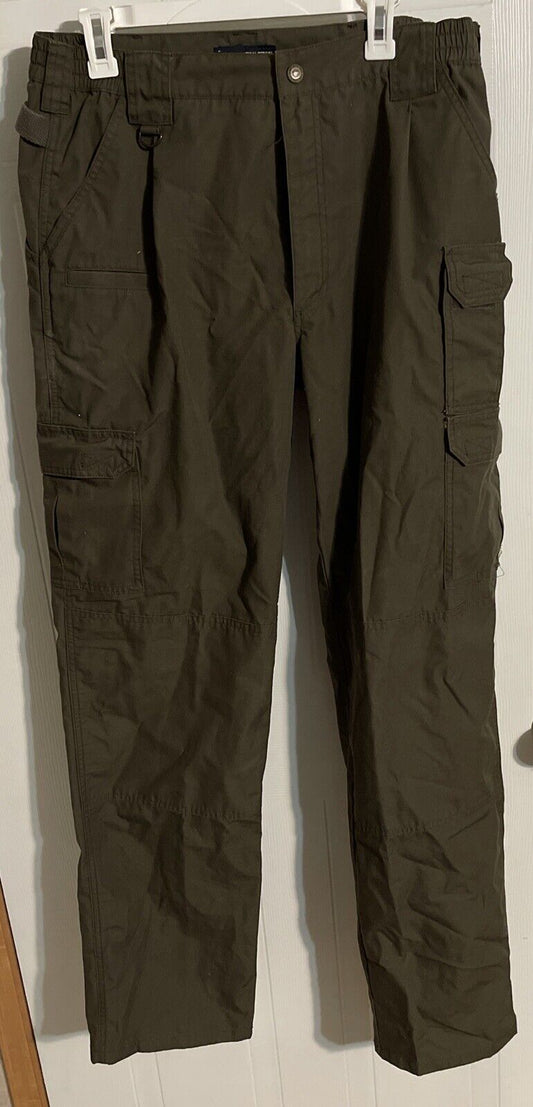 Mens tactical cargo pants in dark olive green with multiple pockets and belt loops from 1118 Emporium