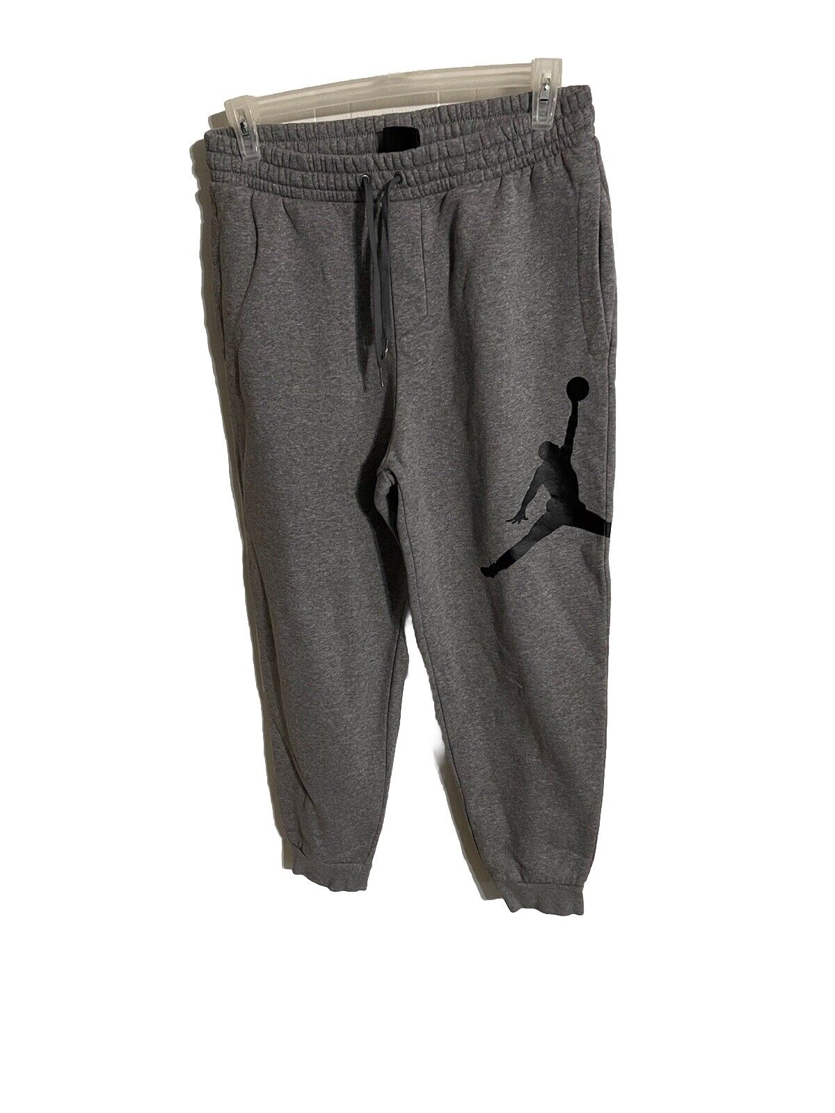 Gray Air Jordan jogger set pants with black Jumpman logo and drawstring waist