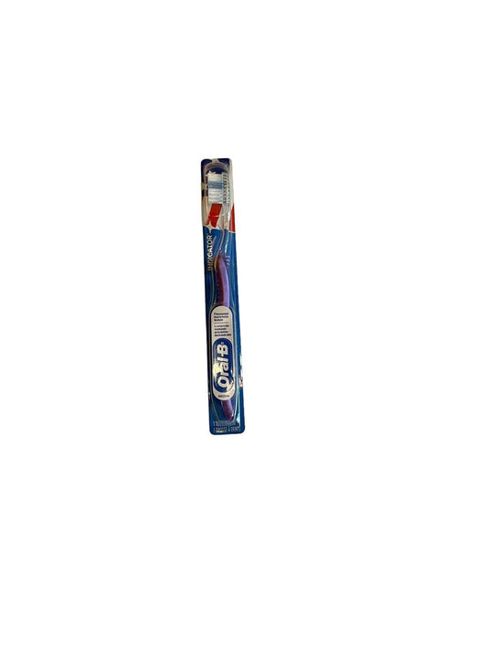 Oral B Indicator toothbrush 2016 in blue packaging with white and red bristles