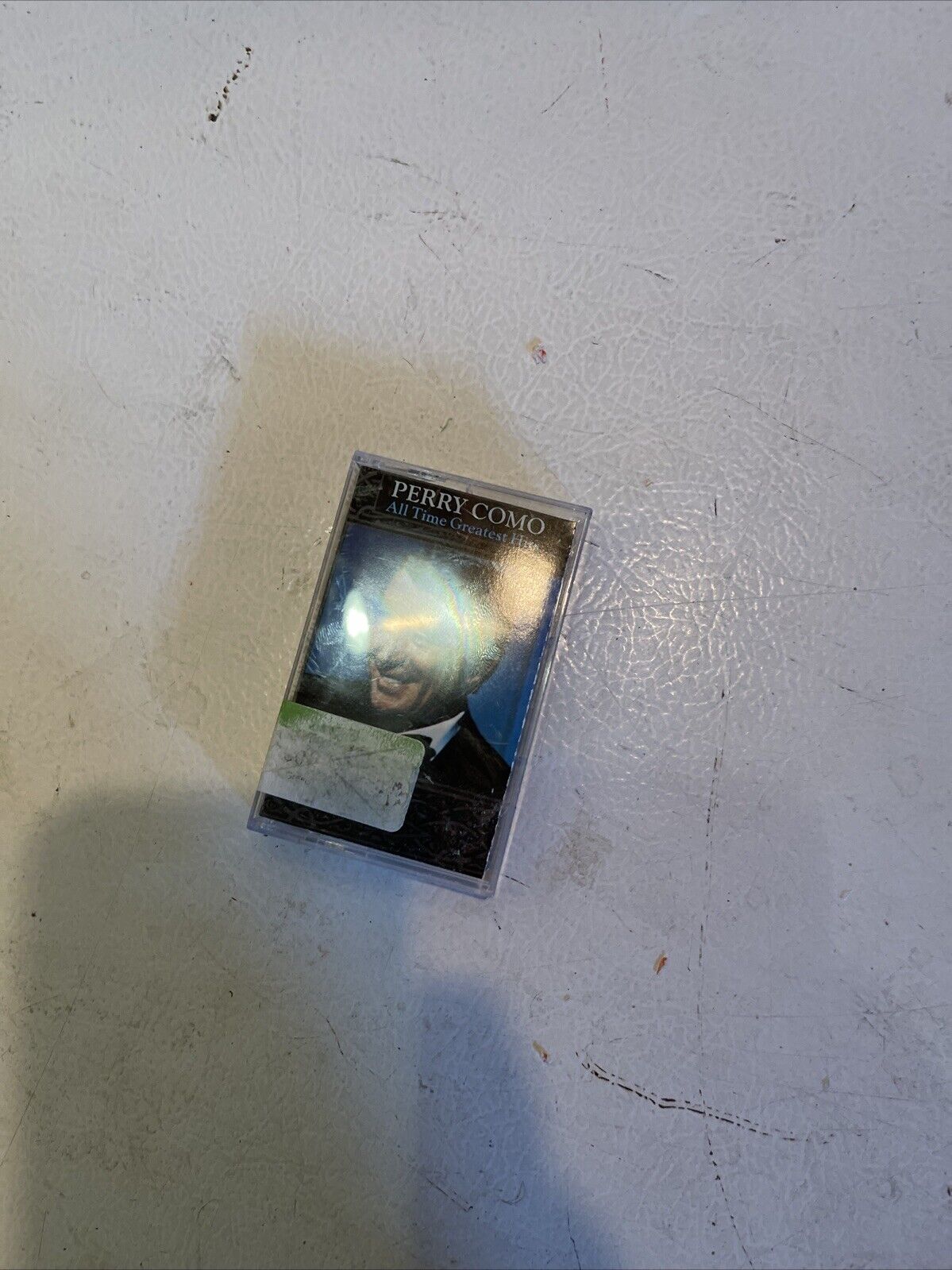 Perry Como cassette tape with vintage cover featuring a portrait of Perry Como on a white background