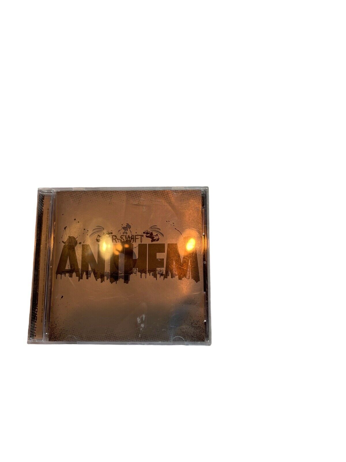 R-Swift Anthem CD album cover with dark urban cityscape design by 1118 Emporium