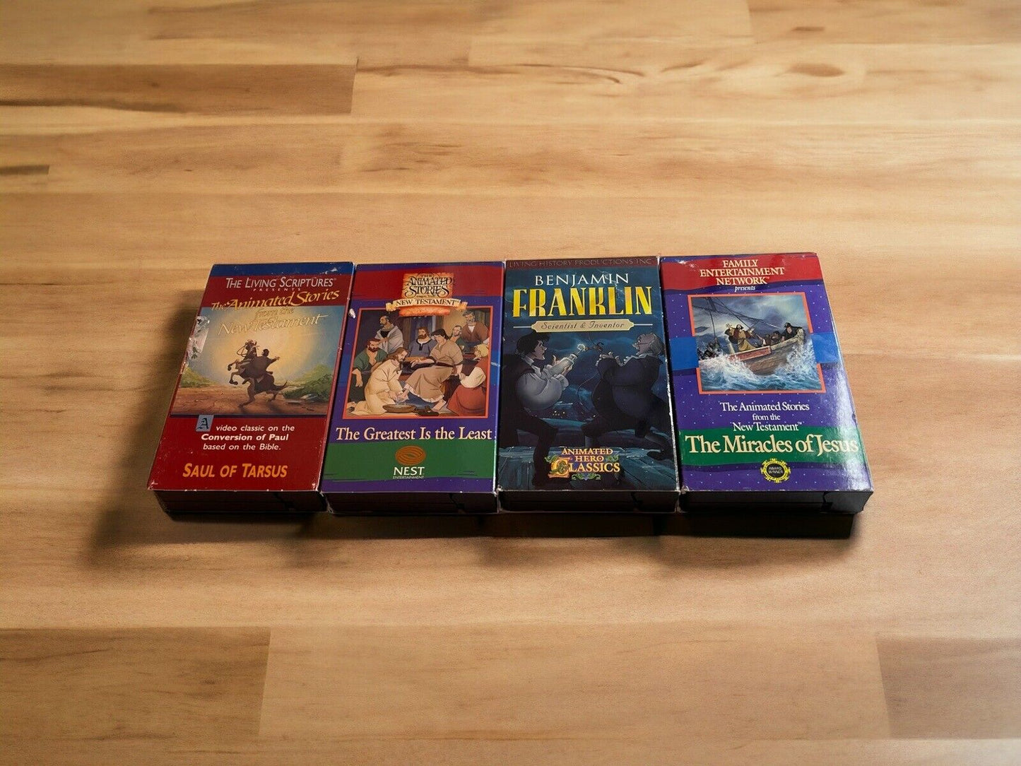 Religious animated VHS lot featuring Saul of Tarsus, The Greatest Is the Least, Benjamin Franklin, and The Miracles of Jesus