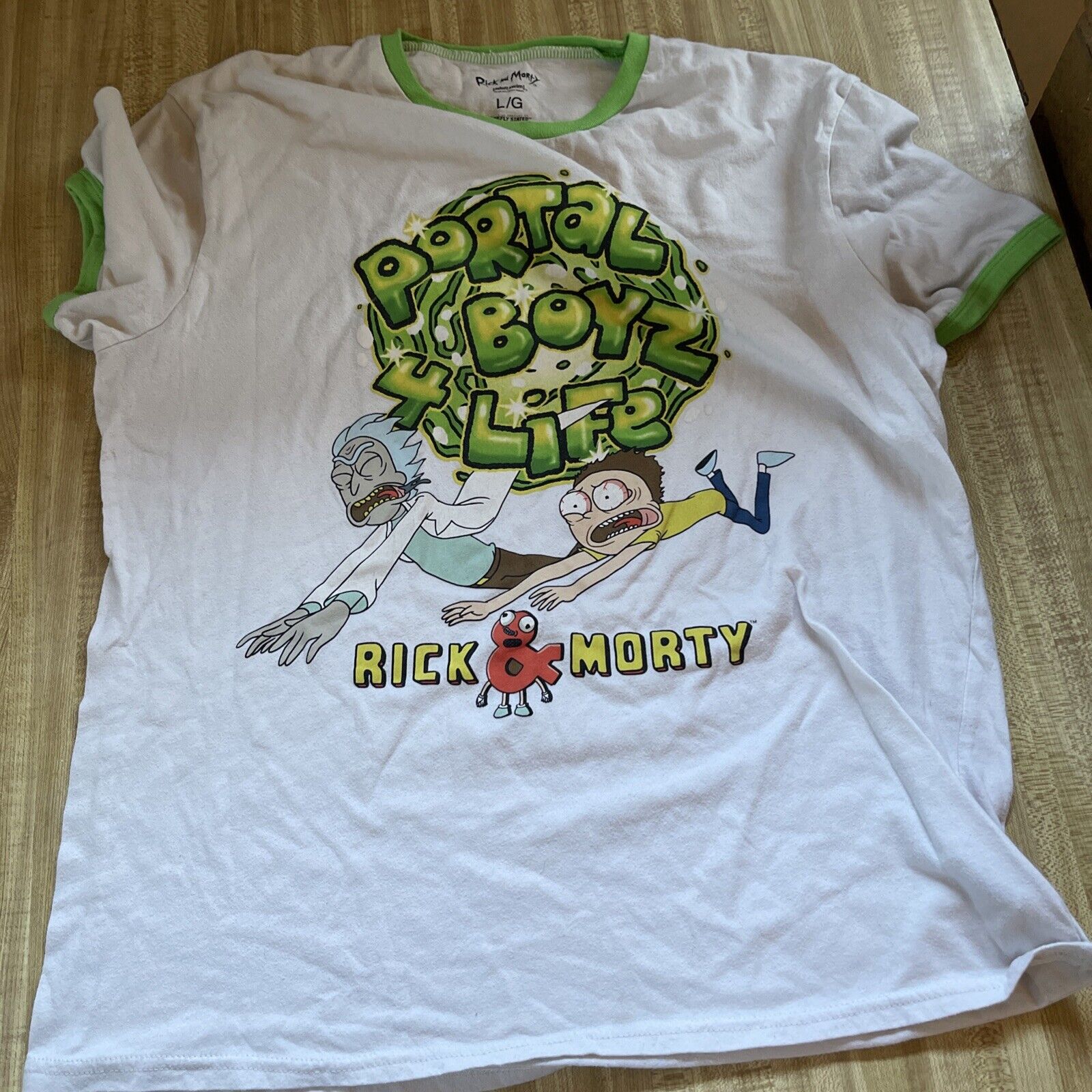 Rick and Morty ringer t shirt with Portal Boyz 4 Life graphic and green trim on white fabric