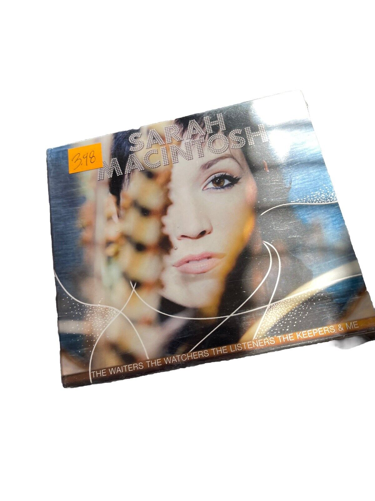 Sarah Macintosh CD album cover featuring a close-up portrait with artistic overlay and title text