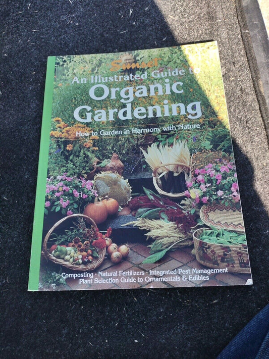 Organic gardening book hardcover titled An Illustrated Guide to Organic Gardening with garden produce and flowers on the cover