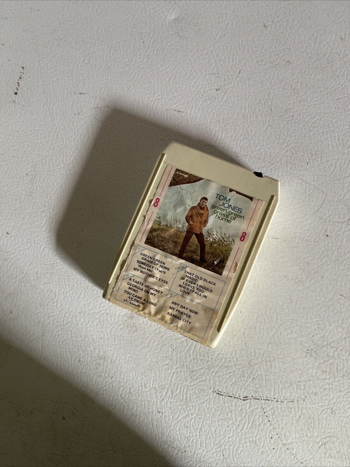 Vintage Tom Jones 8 track tape cartridge with album cover featuring Tom Jones standing outdoors