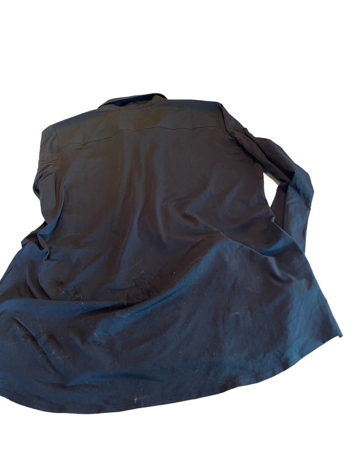 XL black tactical polo shirt laid flat showing the back side with long sleeves