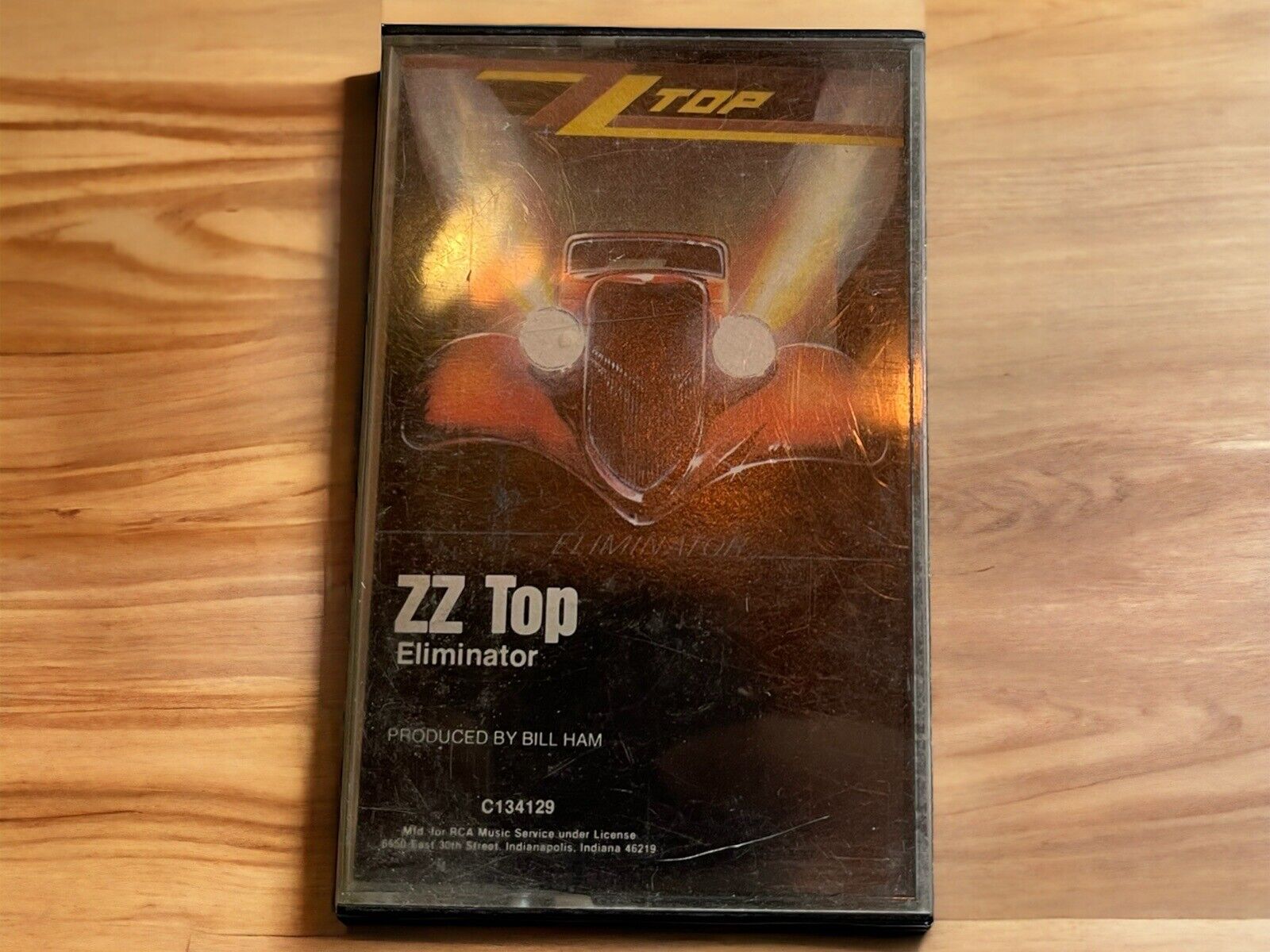 ZZ Top Eliminator cassette tape featuring classic album artwork with vintage car on black background