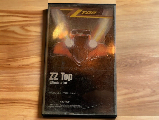 ZZ Top Eliminator cassette tape featuring classic album artwork with vintage car on black background
